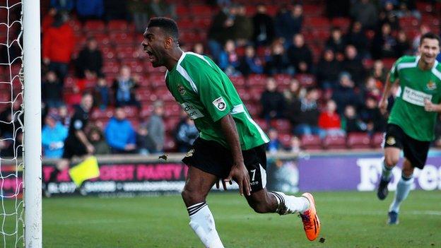 Worcester City striker Daniel Nti celebrates his equaliser against Scunthorpe United at Glanford Park