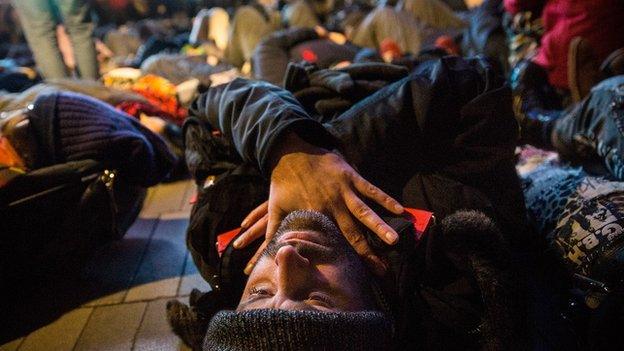 Man participates in a die-in