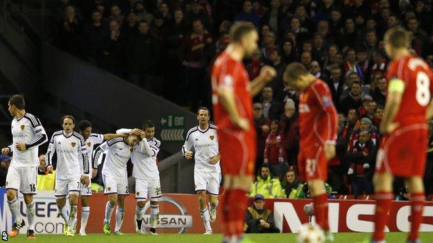 Basel celebrate scoring against Liverpool at Anfield in the Champions League