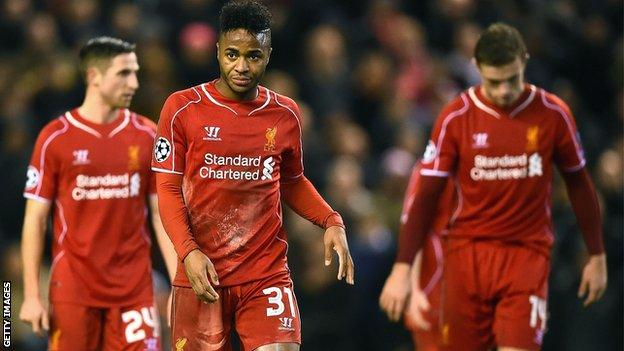 Liverpool players Raheem Sterling, Joe Allen and Jordan Henderson