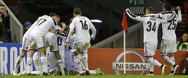 Basel celebrate scoring at Liverpool in the Champions League