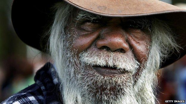 An indigenous Australian arrives to hear Australian Prime Minister Kevin Rudd deliver an apology to the Aboriginal people for injustices committed over two centuries of white settlement at the Australian Parliament on 13 February 2008 in Canberra, Australia