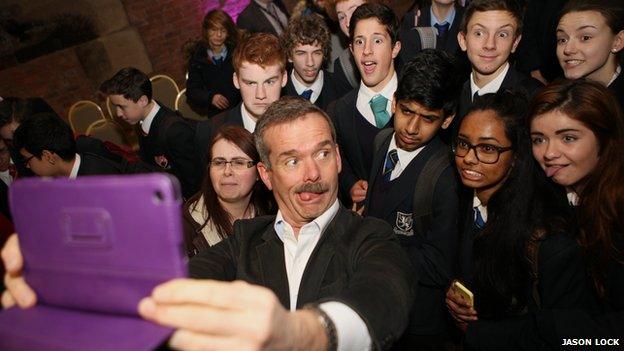 Chris Hadfield takes selfie with kids