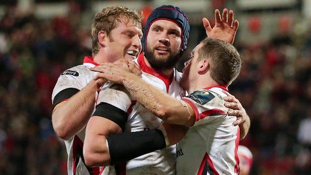 Dan Tuohy [centre] and Franco van der Merwe [left] congratulate try-scorer Darren Cave during the win over the Scarlets