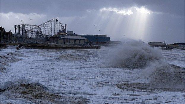 Waves crash onto the promenade on December 10, 2014 in Blackpool