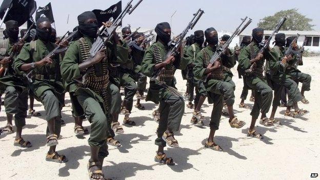 Hundreds of newly trained al-Shabab fighters perform military exercises in the Lafofe area of Somalia