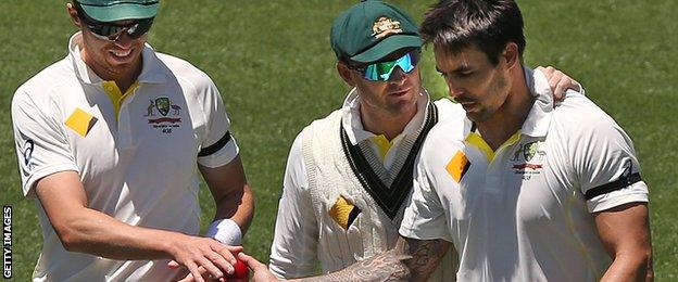 Michael Clarke with Mitchell Johnson