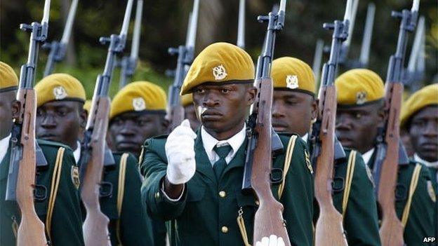 Zimbabwean soldiers attend President Robert Mugabe's swearing in ceremony for a sixth term in office in Harare, on 29 June 2008