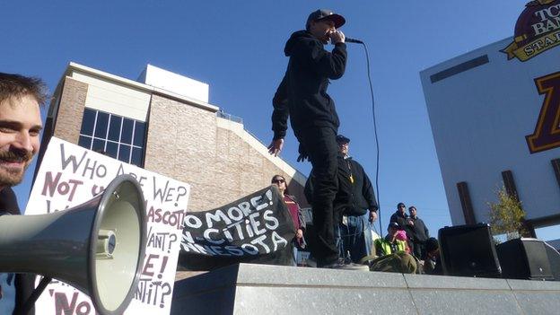 Hip-hop artist Jordan Brien - aka Mic Jordan - performs outside of a Washington Redskins game in Minnesota