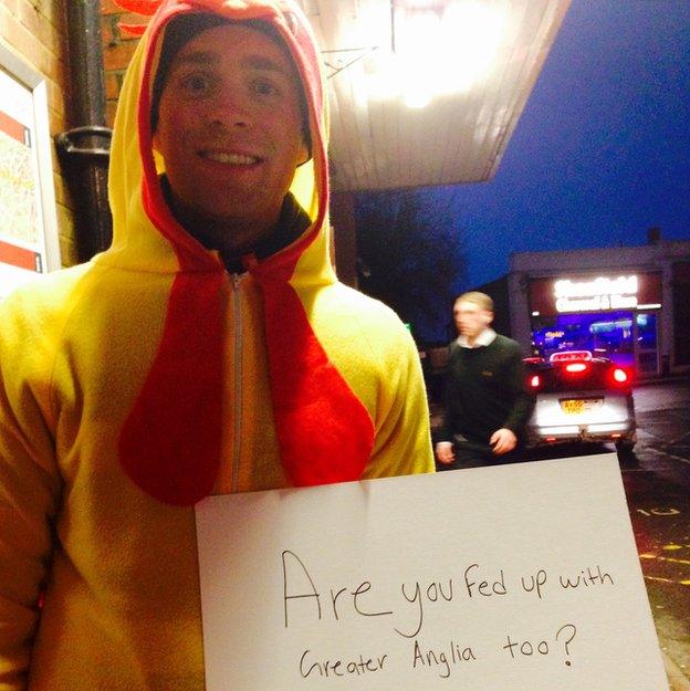 Colin Crerar dressed as a chicken at Shenfield Station