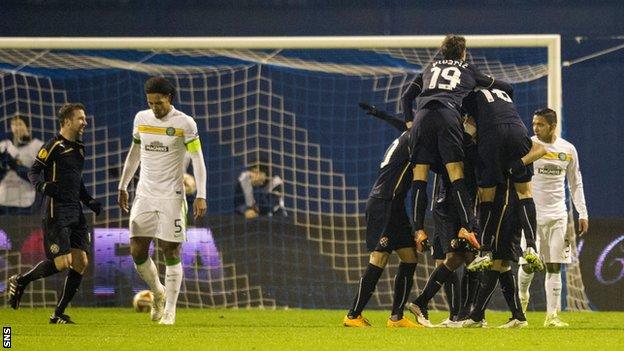 Dinamo Zagreb players congratulate goalscorer Marcelo Brozovic after he puts his side in front against Celtic.