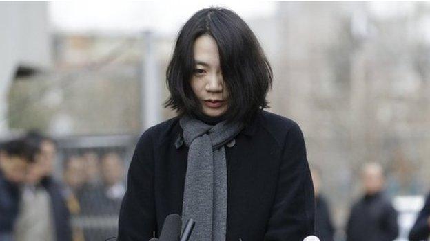 Cho Hyun-ah, who was head of cabin service at Korean Air and the oldest child of Korean Air chairman Cho Yang-ho, speaks to the media upon her arrival for questioning at the Aviation and Railway Accident Investigation Board office of Ministry of Land, Infrastructure and Transport in Seoul, South Korea, Friday, 12 December 2014.