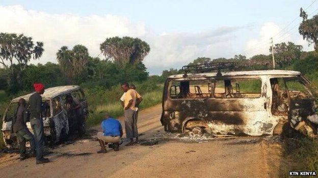 Burned buses in aftermath of militant attack in Kenya in 2014