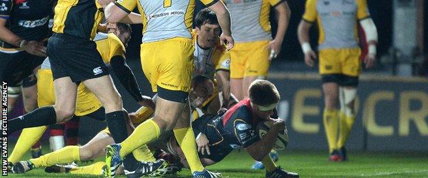 Nick Cudd scores the opening try for Dragons against Bucharest