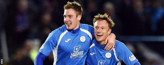 Kevin Holt (left) celebrates putting Queen of the South 1-0 ahead against Rangers on Friday