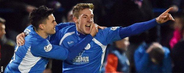 Kevin Holt (right) celebrates after putting Queen of the South ahead