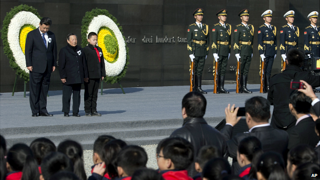 Chinese President Xi Jinping, left, attends a ceremony to mark China's first National Memorial Day at the Nanjing Massacre Memorial Hall - 13 December 2014