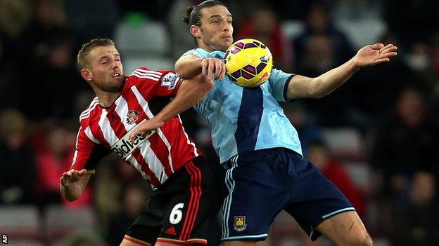 Andy Carroll and Lee Cattermole