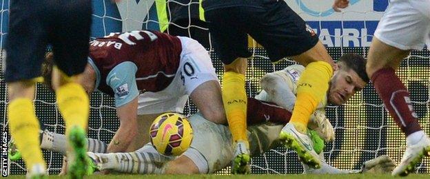 Southampton keeper Fraser Forster in action against Burnley