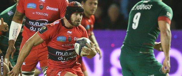 Leigh Halfpenny takes on Leicester's Ben Youngs