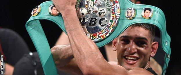 Amir Khan celebrates his win