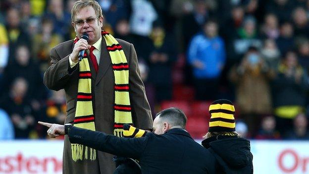 Sir Elton with family