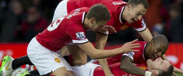 Manchester United celebrate scoring the opener against Liverpool