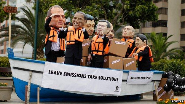 Activists wearing masks depicting (left to right) US President Barack Obama, Australian Prime Minister Tony Abbott, Canadan Prime Minister Stephen Harper, Chinese President Xi Jinping, Russian President Vladimir Putin and Indian Prime Minister Narendra Modi demonstrate to demand cuts in global emissions during the COP 20 meeting.