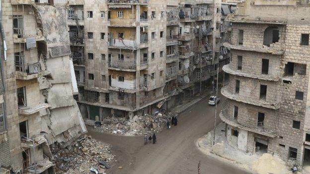 Damaged buildings in Aleppo's al-Shaar district