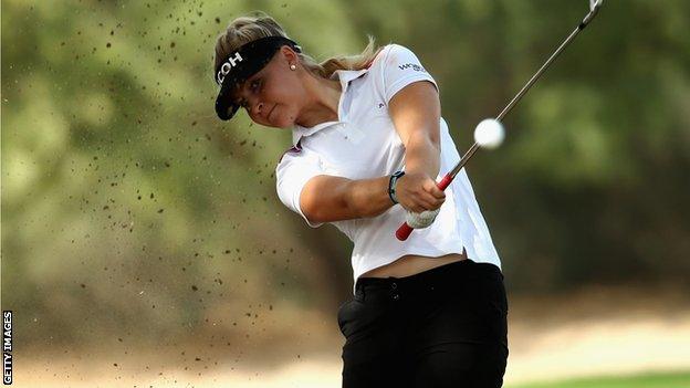 Charley Hull plays her second shot into the third green during the final round of the Omega Dubai Ladies Masters