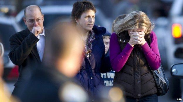 Distraught people appeared in Newtown, Connecticut, on 14 December 2012