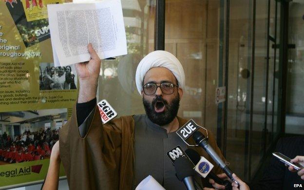 Man Haron Monis speaks to the media after leaving Downing Centre Local Court in Sydney on 10 November 2009