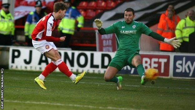 Tom Bradshaw slots his 10th goal of the season for Walsall against Barnsley