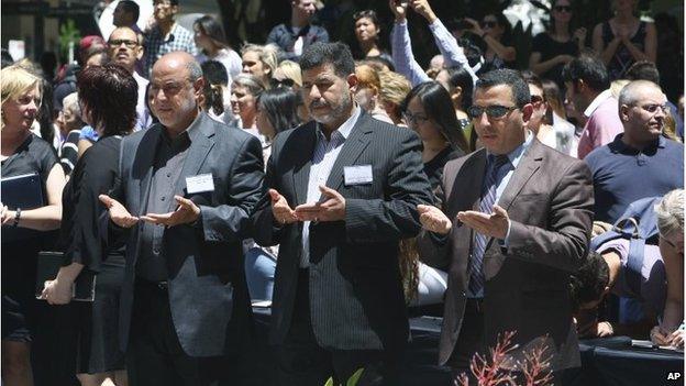 Muslim men pray in Martin Place, Sydney (16 Dec 2014)