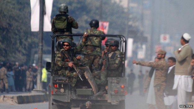 Pakistani troops at the scene