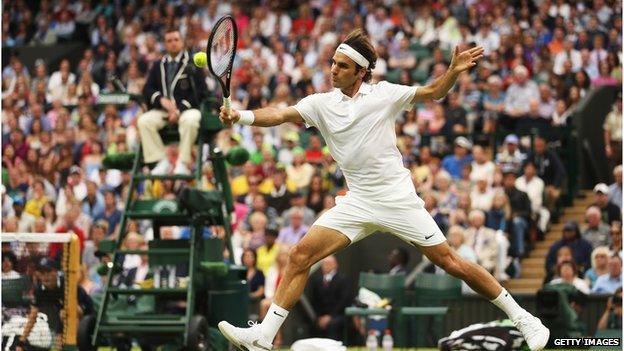 Roger Federer plays on Centre Court at Wimbledon