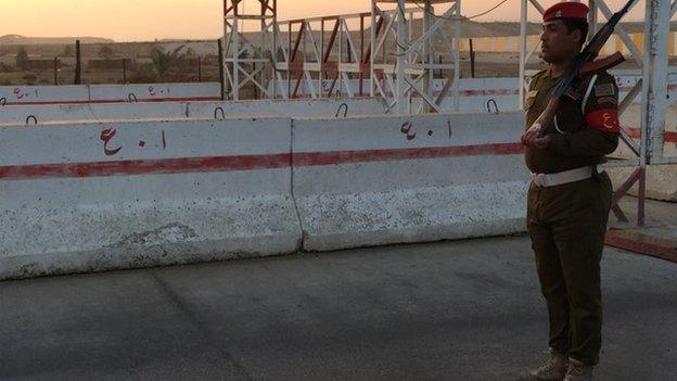 Iraqi soldier guarding Ain Al-Asad base