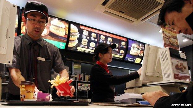 Customer being served in McDonald's