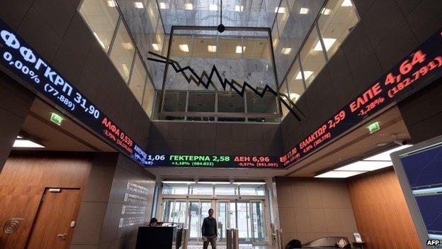 A man walk on December 8, 2014 in the Athens stock exchange