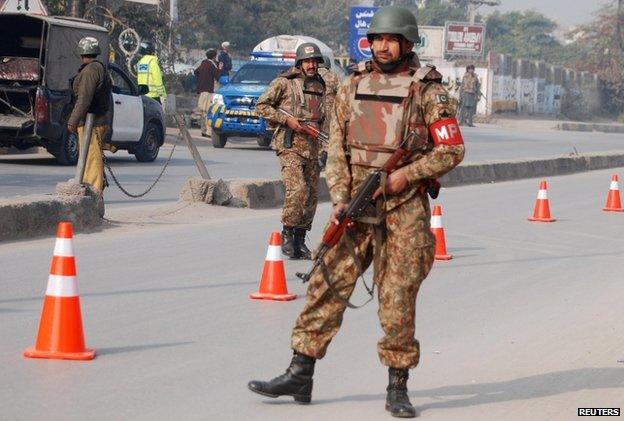 Scene outside army-run school under attack from Taliban in Peshawar