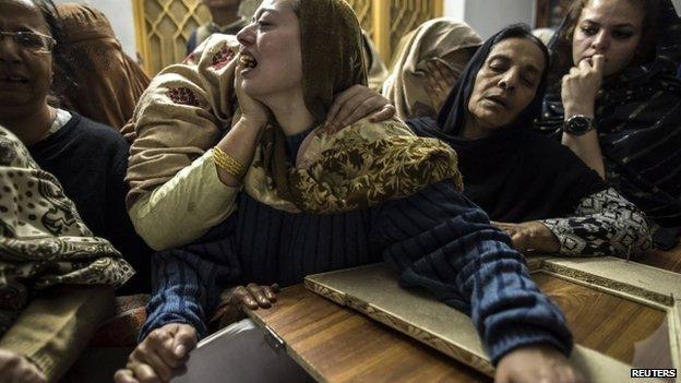 A mother mourns her son Mohammed Ali Khan, 15, a student who was killed during an attack by Taliban gunmen on the Army Public School, at her house in Peshawar December 16, 2014