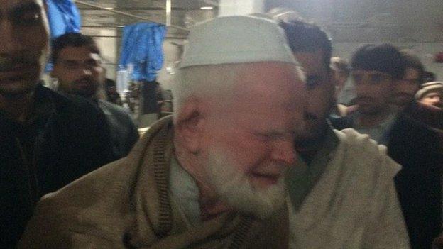 Inside lady reading hospital -This man learned that his brother was killed in Taliban attack, 16 December