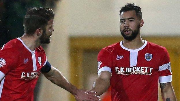 Kane Hemmings celebrates scoring for Barnsley against Chester