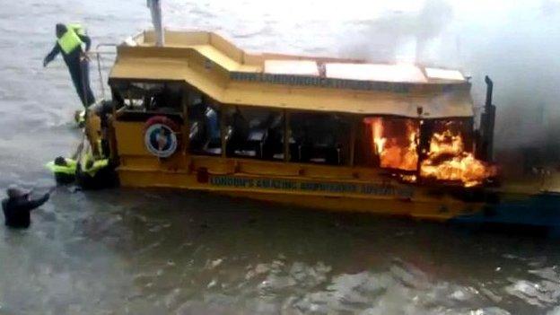 Tourist boat on fire