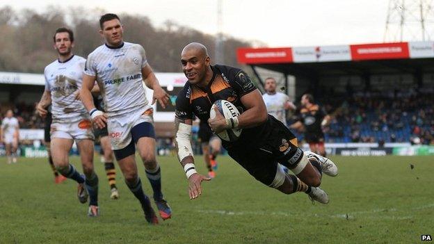 Wasps' Tom Varndell scores a try during the club's final match at Wycombe's Adams Park