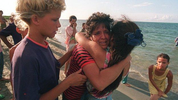 A mother says goodbye to her daughter as she sets off for Miami