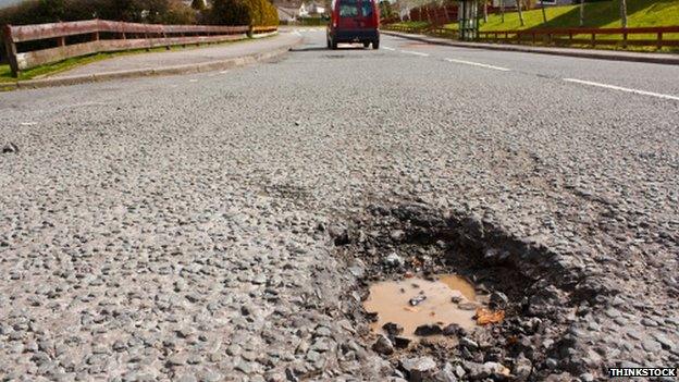 A pothole in the road