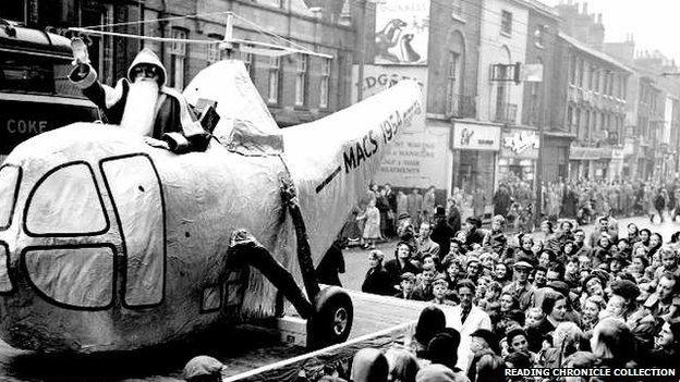 Father Christmas arriving by 'helicopter'