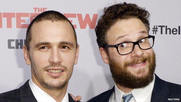 James Franco (L) and Seth Rogen pose during premiere of the film "The Interview" in Los Angeles, California