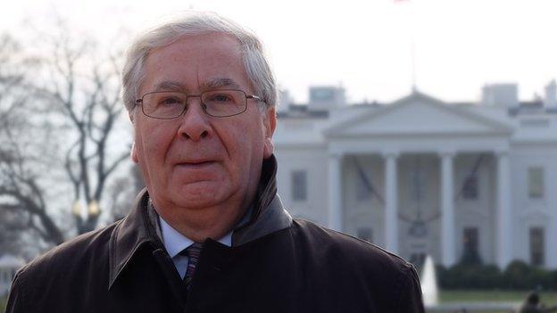 Mervyn King in front of the White House